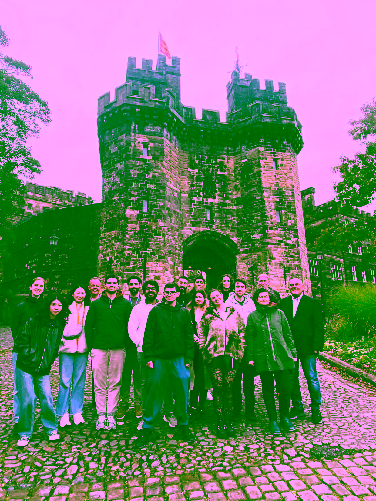 Group of people in front of a castle