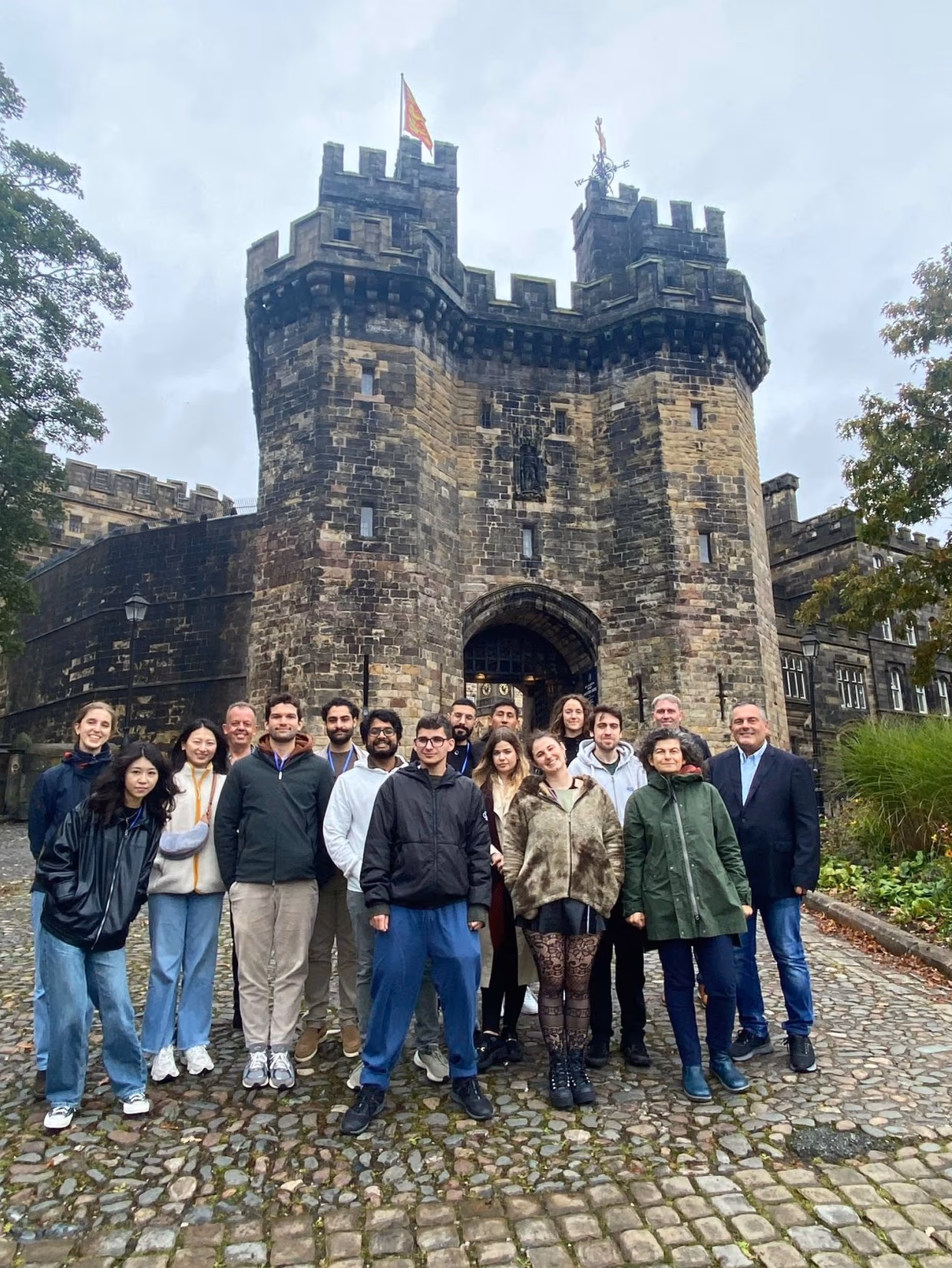 Group of people in front of a castle